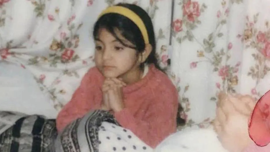 This girl in mother lap is a big bollywood actress