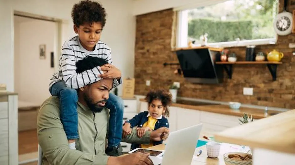 People enjoying work from home with family