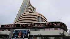Sensex Ends Marginally Lower; Gold Gains Rs 389