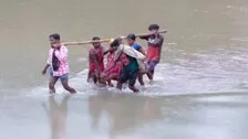 Pregnant Woman In Odisha Forced To Cross River In Sling Sans Road Connectivity