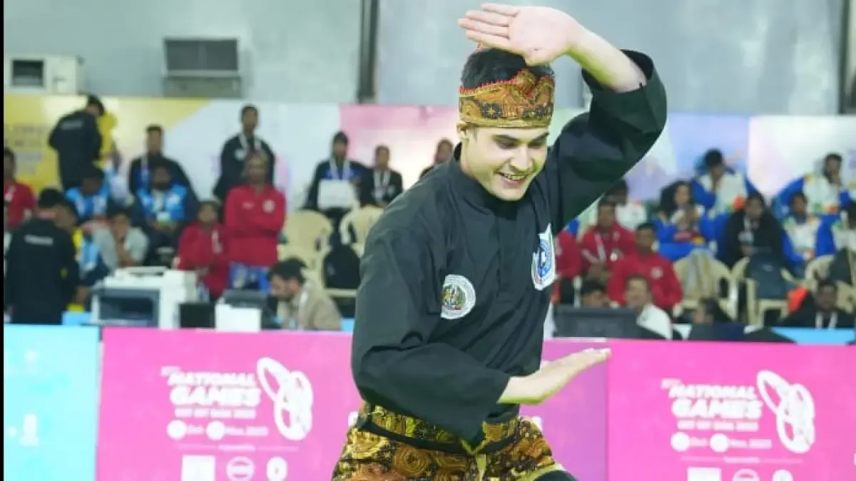 An athlete performs in pencak silat event