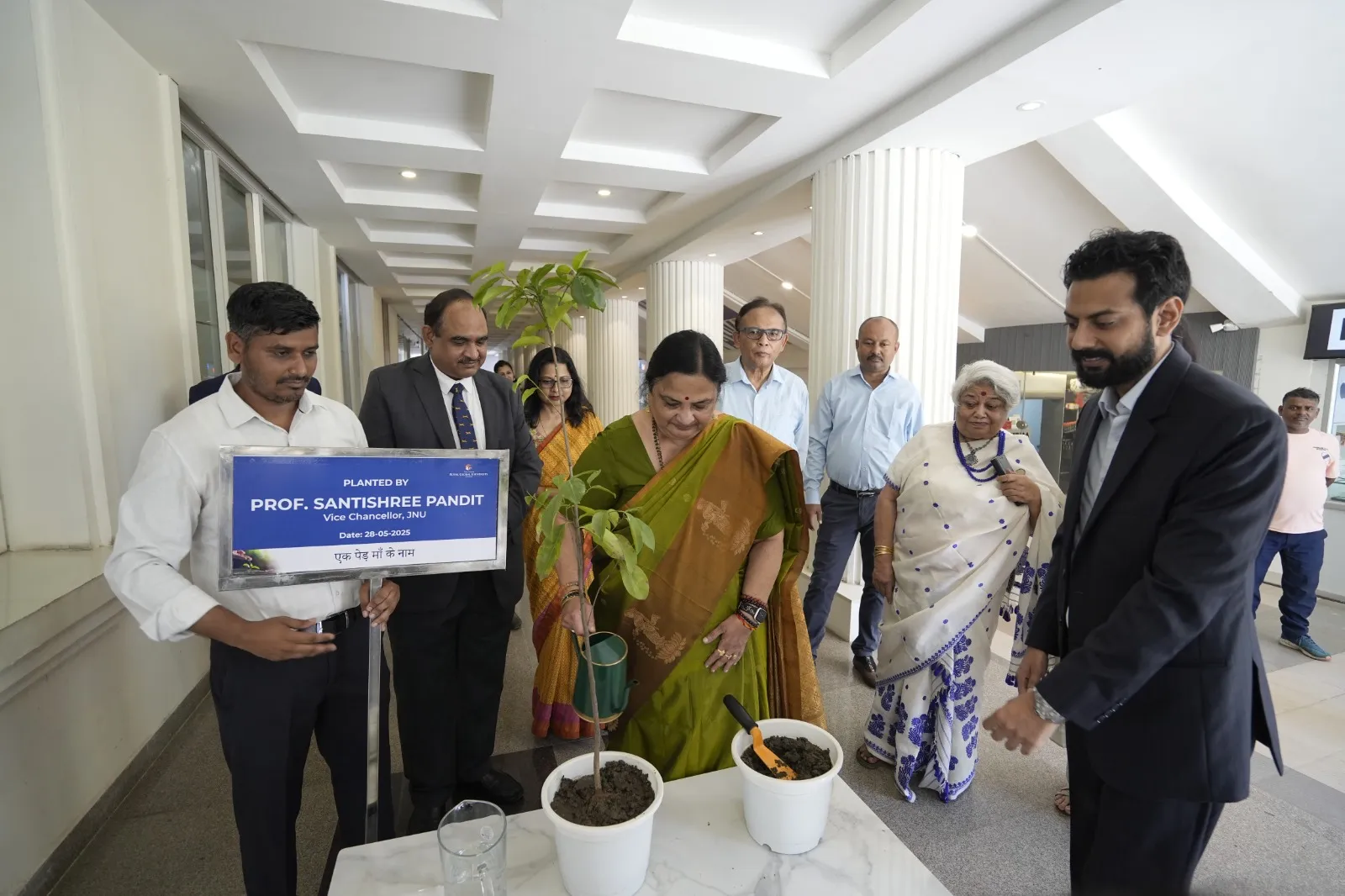 JNU VC Prof. Santishree Pandit planting sapling at RGU