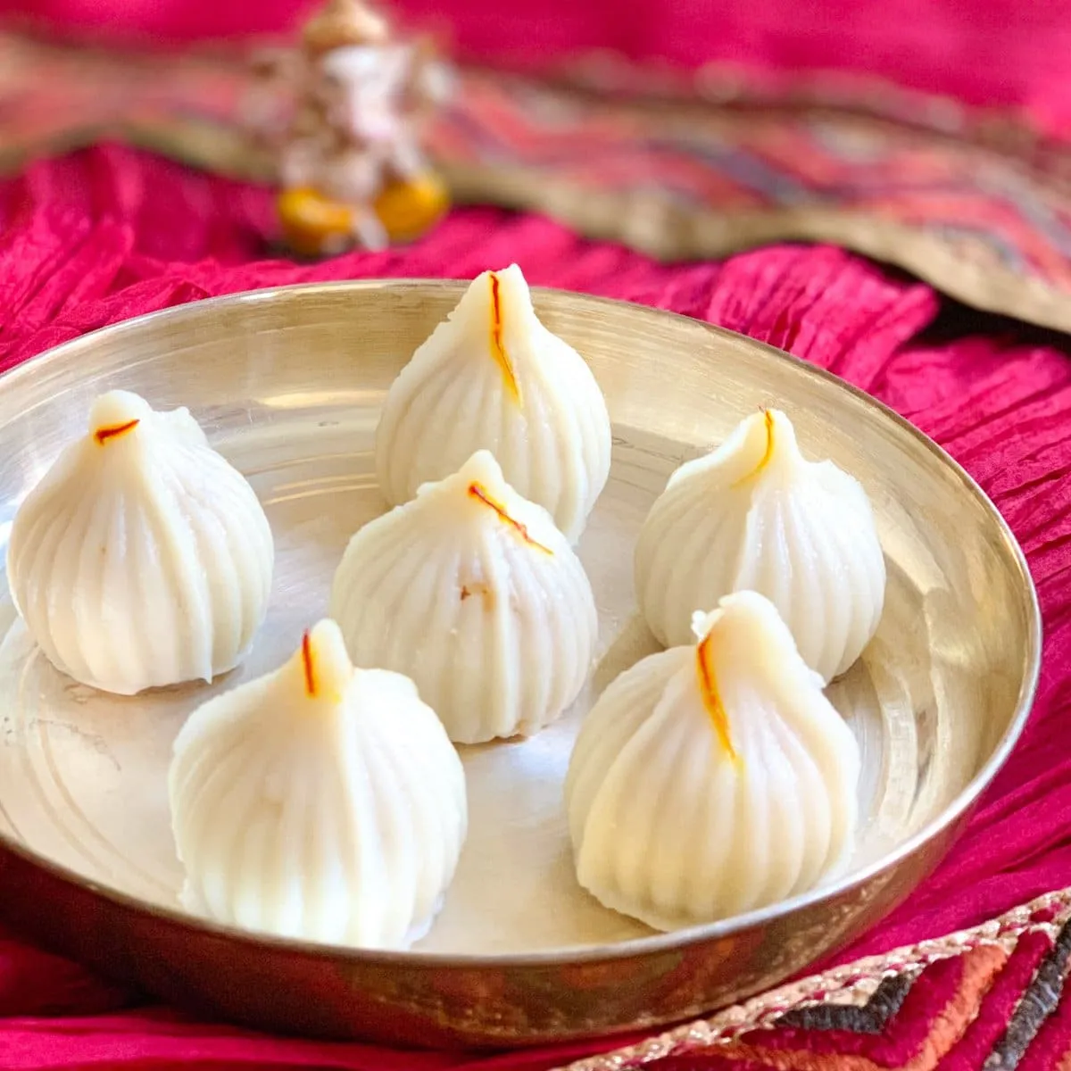 Ukadiche Modak (steamed rice dumplings with sweet coconut filling)