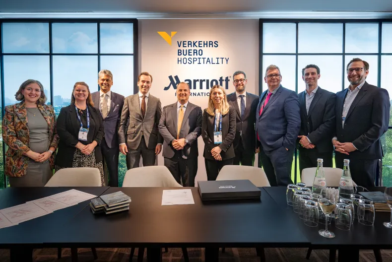 Signing ceremony with Marriott International President and Chief Executive Officer Anthony Capuano and CEO of VERKEHRSBUERO Martin Winkler