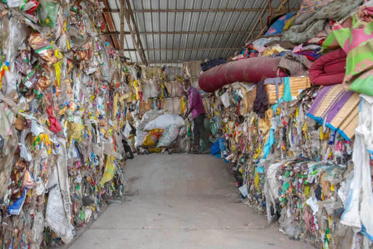 Low-value plastic stacked up at a resource recovery centre in Oottupattarai in Coonoor. Apart from the energy sector, there are increasing green job opportunities in the environmental sector. Image by Abhishek N. Chinnappa/Mongabay.