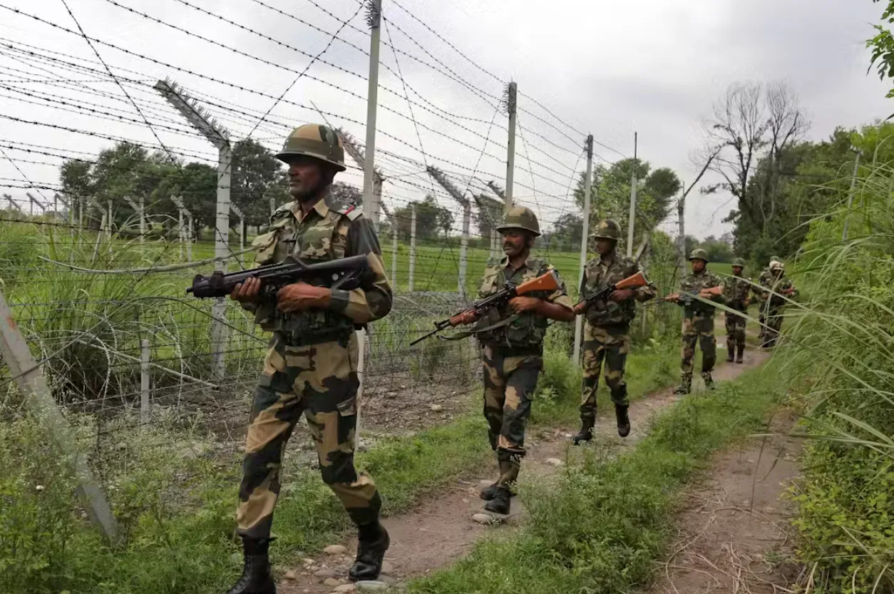 India’s Border Security Force patrol near the India-Pakistan border fencing in Akhnoor, about 35km west of Jammu, India, in 2019. Channi Anand/AP