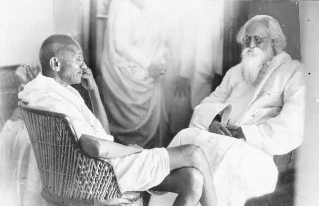 Mahatma Gandhi's promise of meeting Rabindranath Tagore annually is  honoured when he visited him at Santiniketan in this February 20, 1940  picture. Here Tagore is in rapt attention to what Mahathma Gandhi