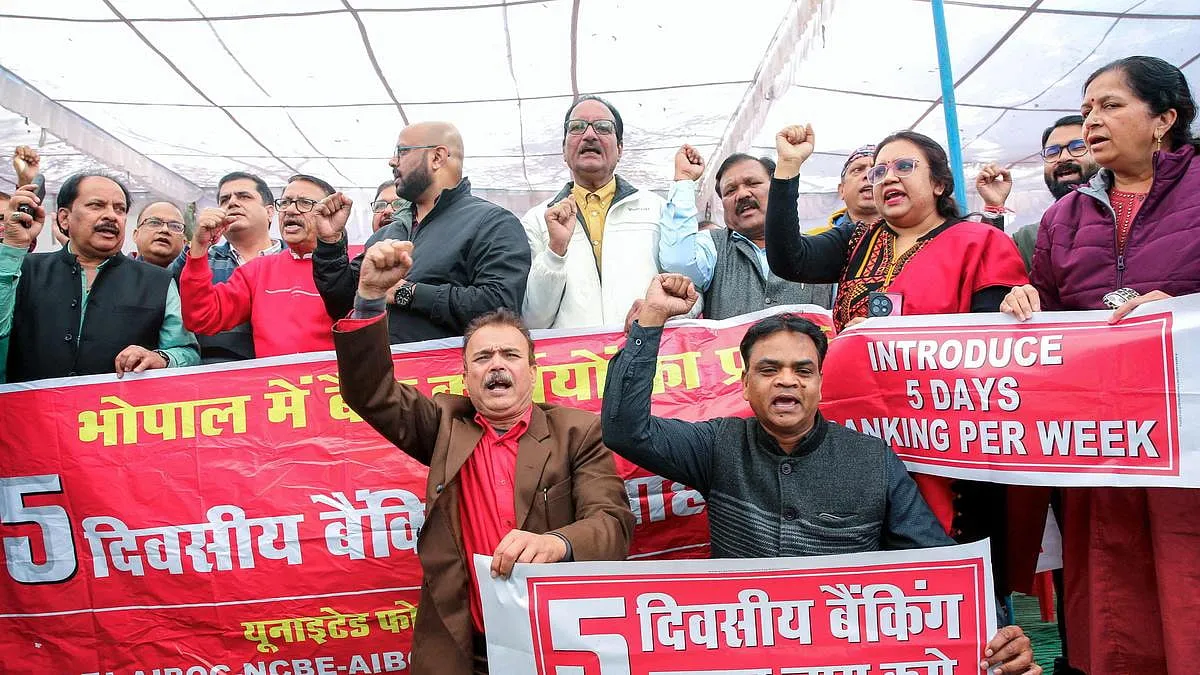 Bank employees, under the banner of the United Forum of Bank Unions (UFBU), protest demanding the implementation of a five-day banking week in Bhopal. 