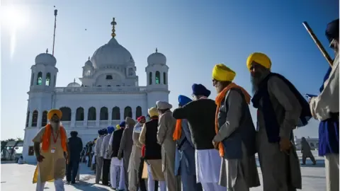 Kartarpur corridor: India pilgrims in historic visit to Pakistan temple