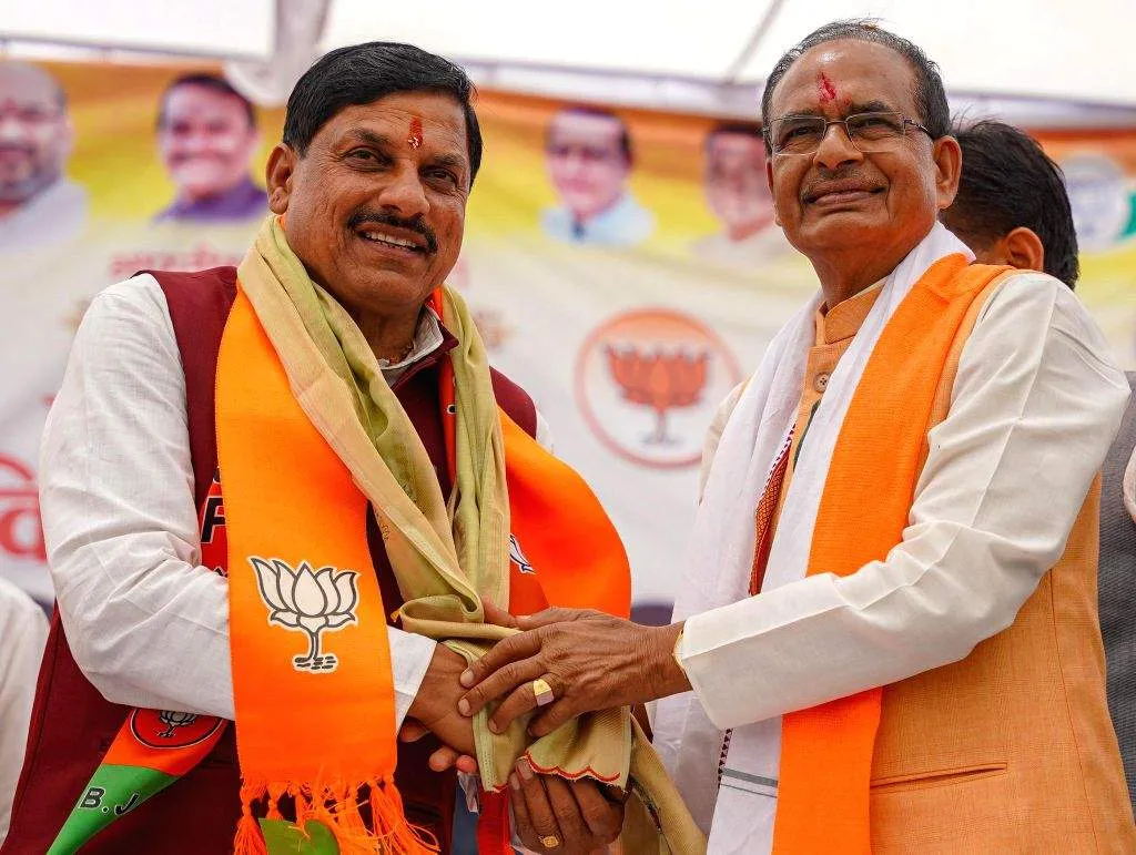 Madhya Pradesh Chief Minister Mohan Yadav and former CM Shivraj Singh  Chouhan during a public ...