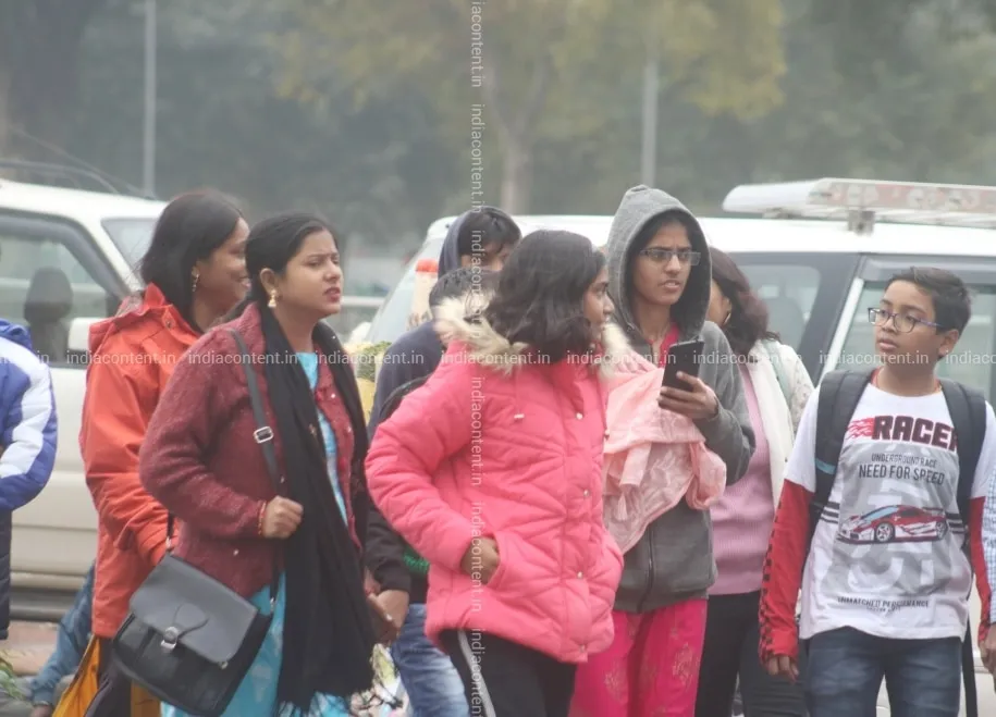 Buy New Delhi People wear woolen clothes to keep themselves warm on a  chilly winter morning as temperatures dropped after rains in New Delhi on  Dec 13 2019 Photo IANS Pictures, Images,