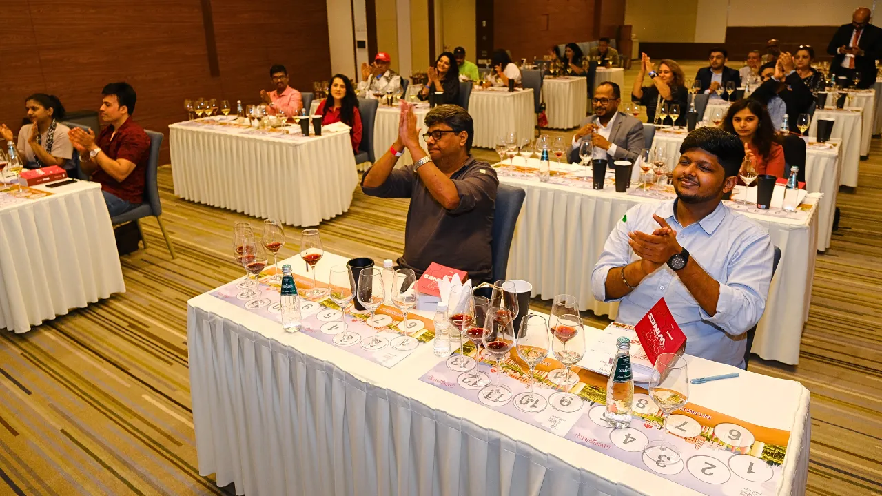 Wine enthusiasts trying out Italian wines in masterclass conducted by Gambero Rosso