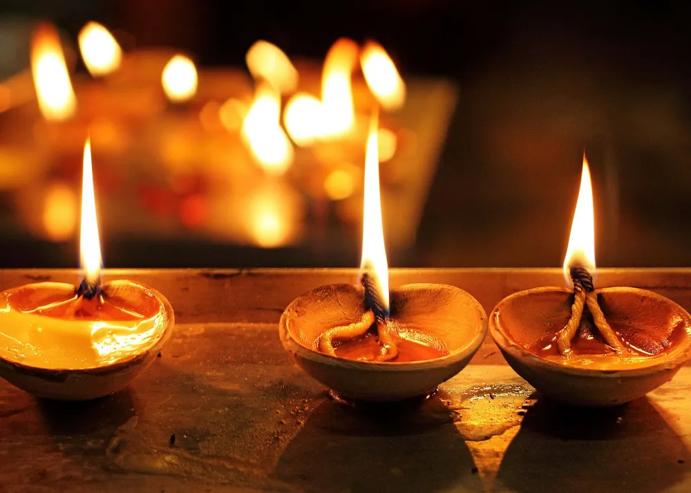  earthen lamps and Diyas