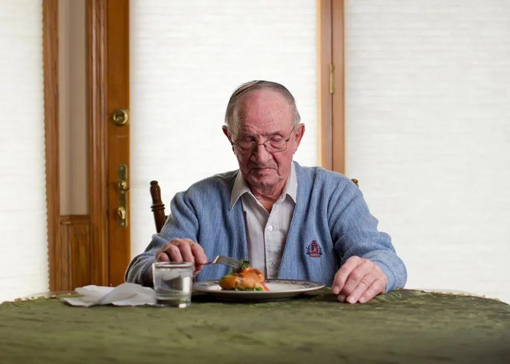 old man eating healthy food