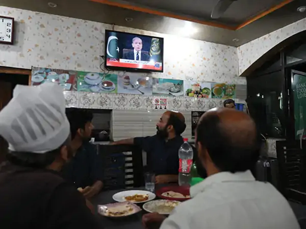 People listening to the speech of Pakistan Prime Minister