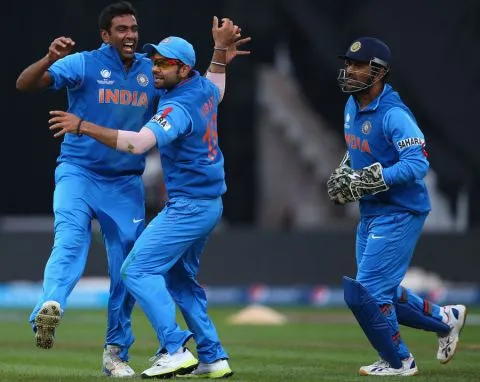 R Ashwin celebrates a wicket with Virat Kohli and MS Dhoni, England v India, Champions Trophy final, Edgbaston, June 23, 2013