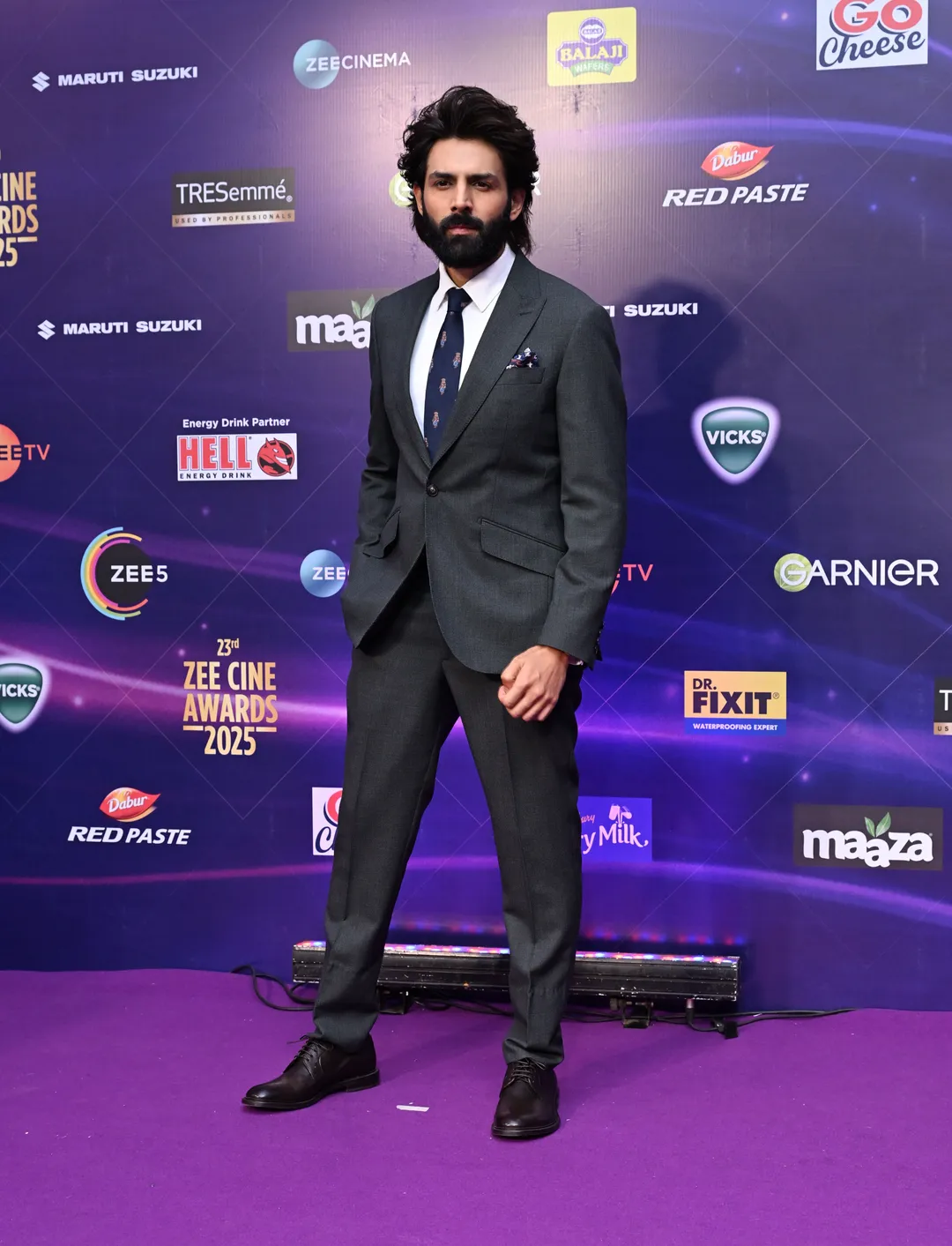 Kartik Aaryan at the Zee Cine Awards 2025 purple carpet