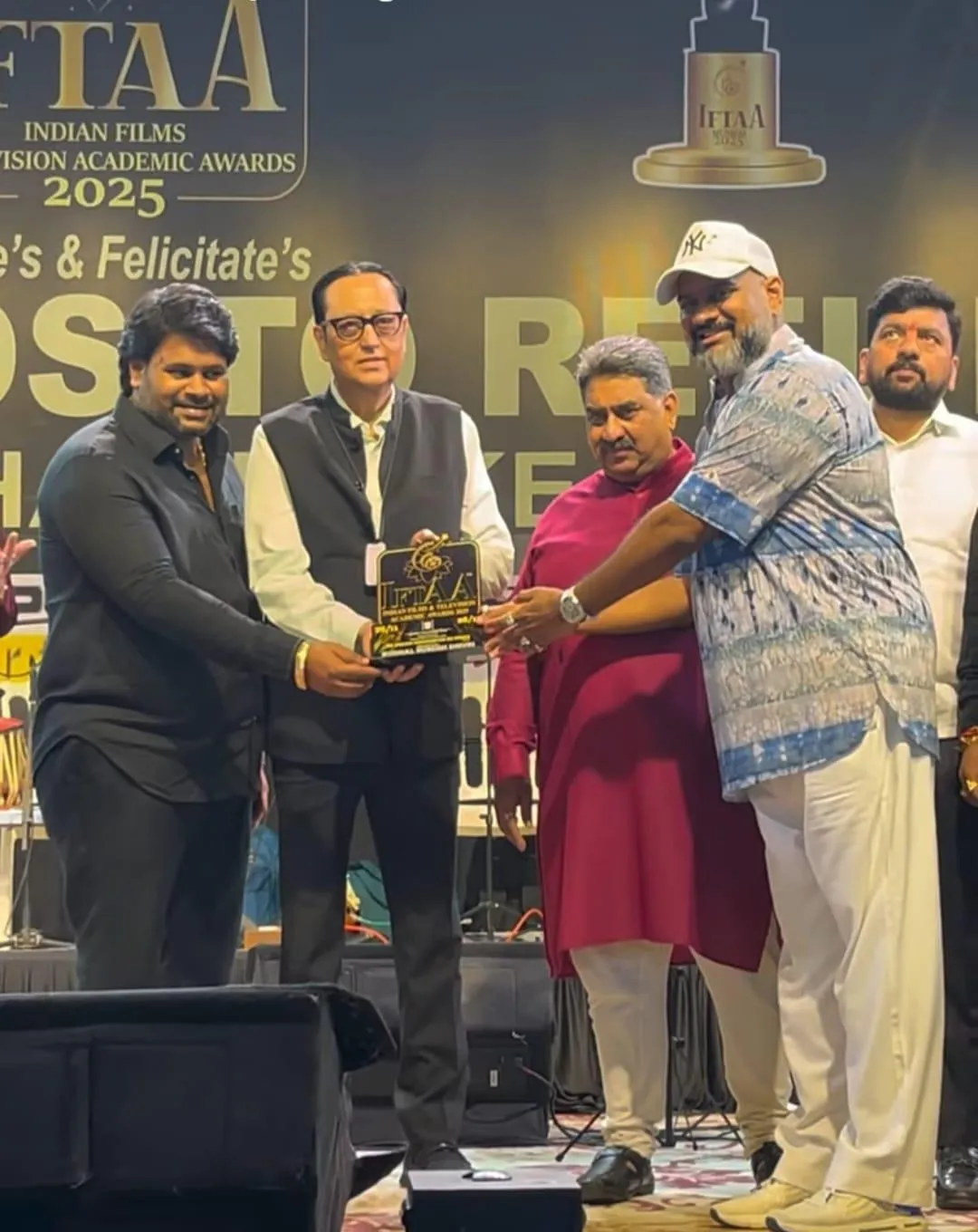 Guest of Honour Shri C S Mishra being honoured on stage