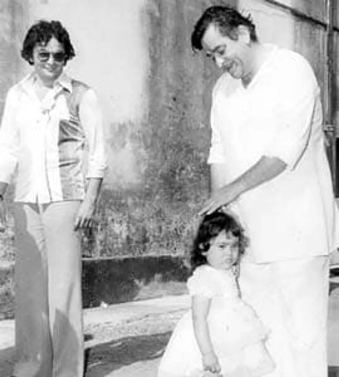 Raj Kapoor with a young Karishma Kapoor, 1980s
