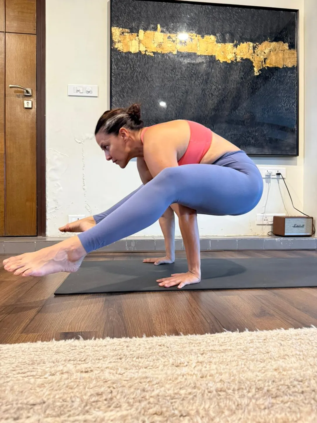 Neha Dhupia doing yoga