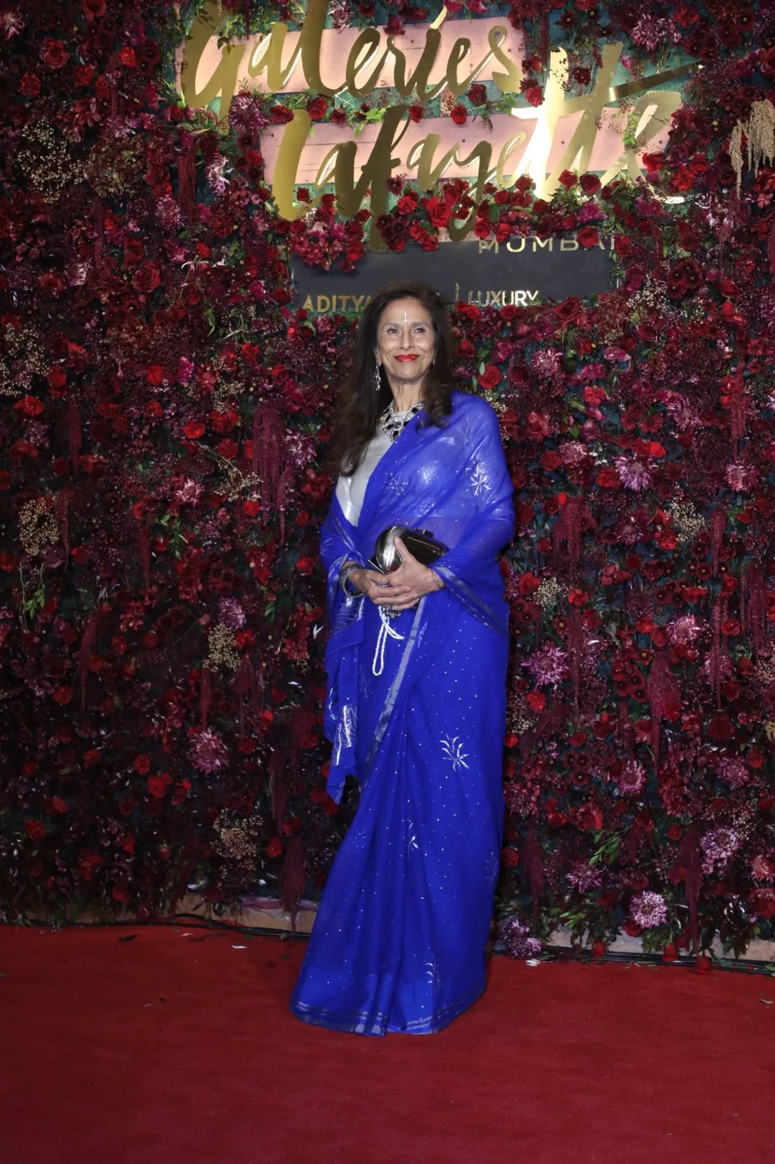  Shobhaa De stood out in a vibrant blue saree at the launch of Galeries Lafayette.