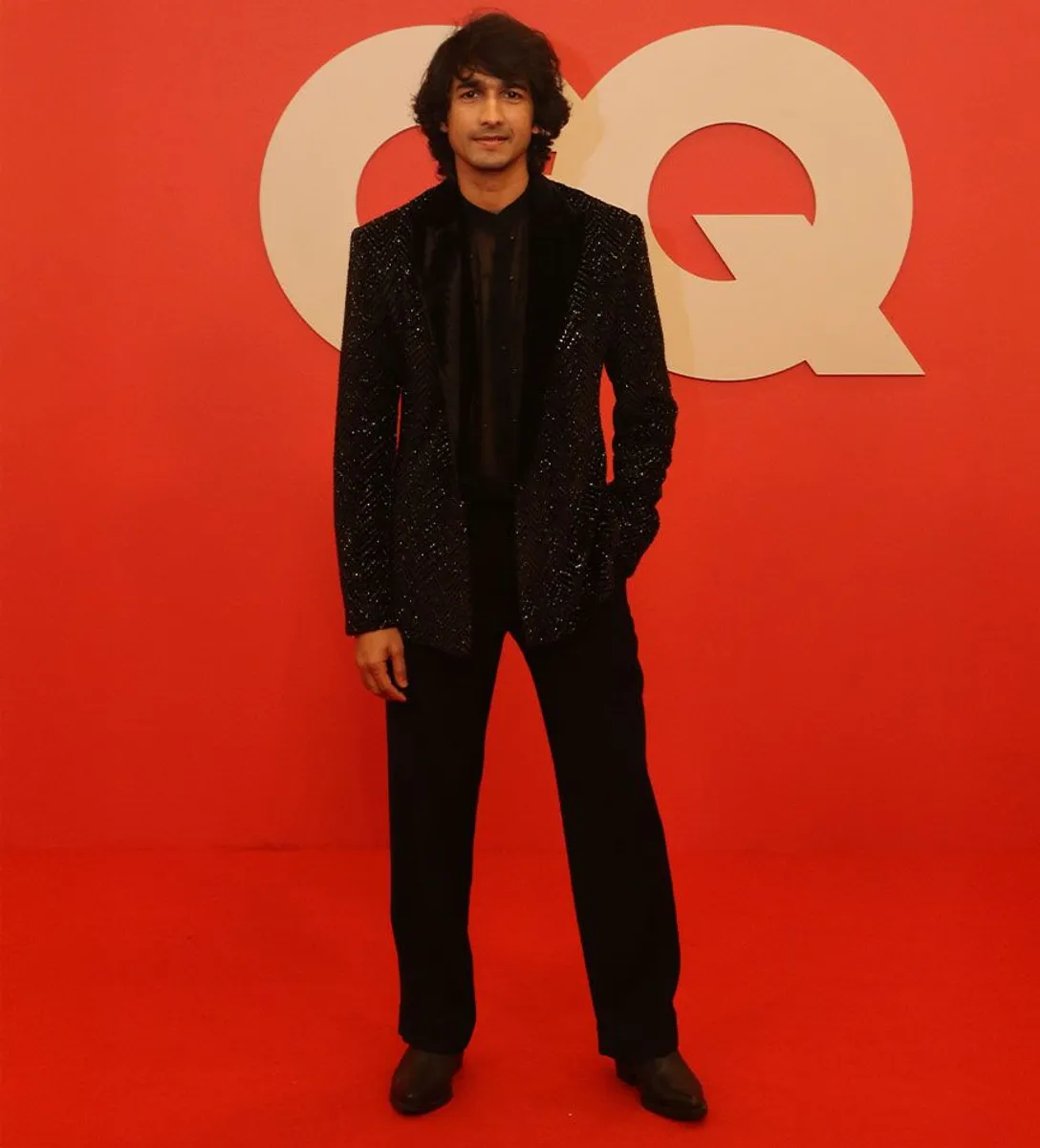 Image may contain Shantanu Maheshwari Person Standing Clothing Formal Wear Suit Adult Coat Jacket and Fashion