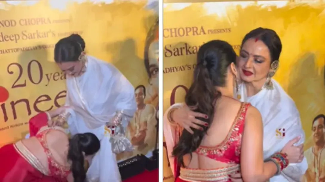 vidya-balan-touches-rekhas-feet-during-parineeta-event