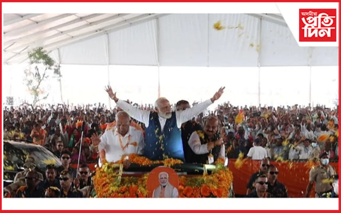 বাংগালুৰুত পুষ্প বৃষ্টিৰে প্ৰধানমন্ত্ৰী মোডীক আদৰণি