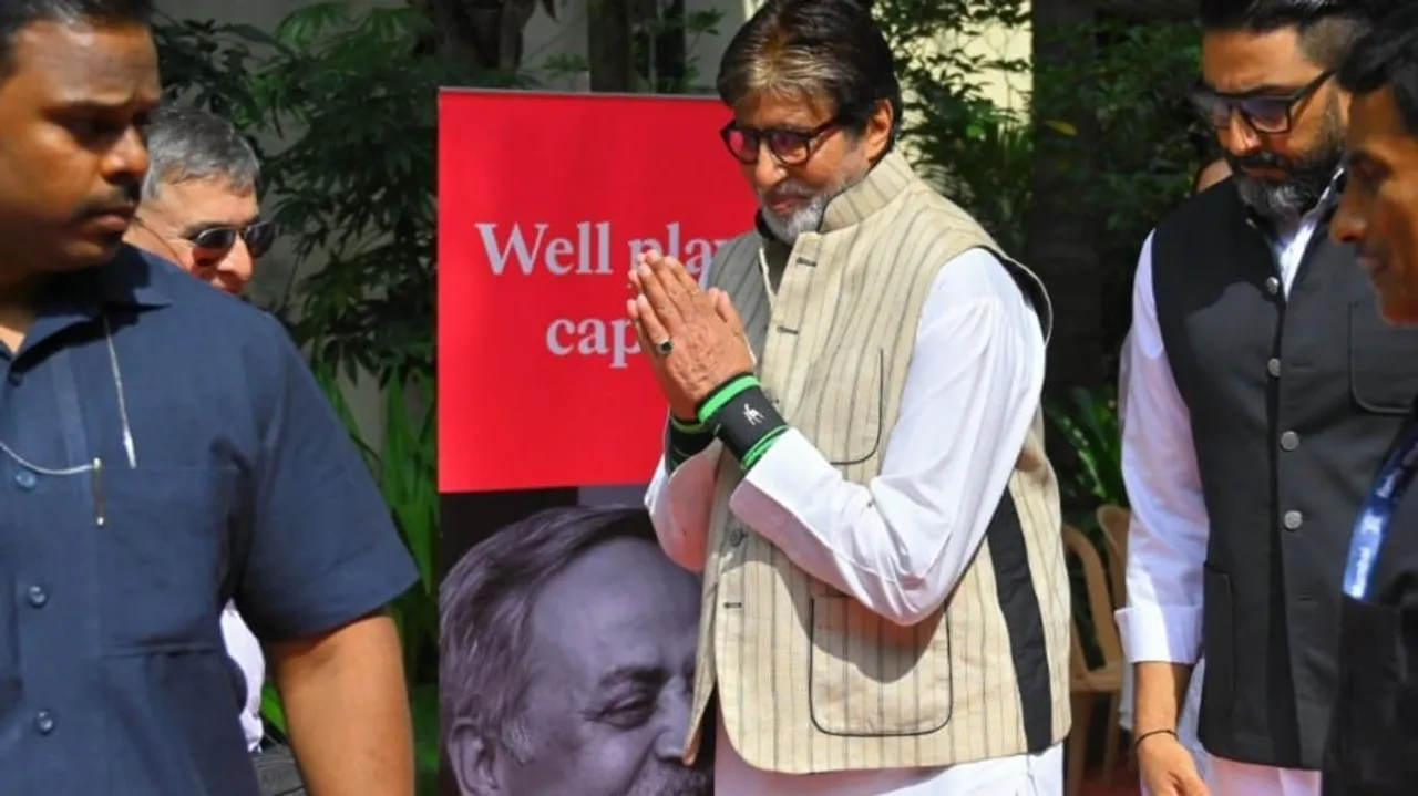 Amitabh Bachchan and Abhishek Bachchan arrive at the Shivaji Park Crematorium in Mumbai to pay final tributes to the advertising legend, Piyush Pandey, on Saturday, October 25, 2025.