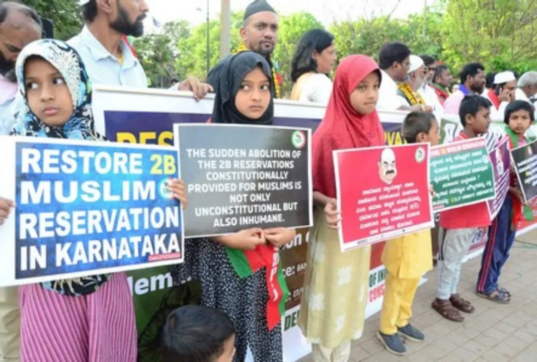  Caption: Bengaluru:Members of SDPI and Muslim community staged a protest against the state government and demanded for restore of 2B Muslim reservation at Freedom Park, in Bengaluru on Monday 27th March 2023.(PHOTO:IANS) 