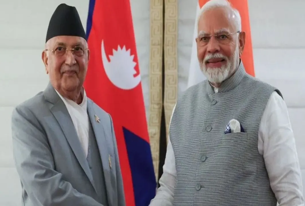  प्रधानमंत्री नरेंद्र मोदी के साथ नेपाल की पीएम केपी शर्मा ओली। फोटो-IANS 