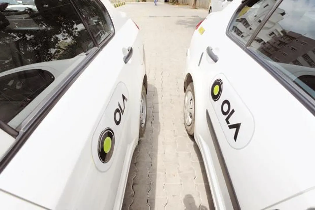 ola k UH x @LiveMint e