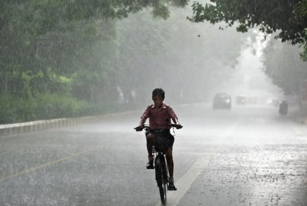 an indian schoolboy rides his bicycle back home during crop cq dam web jpeg