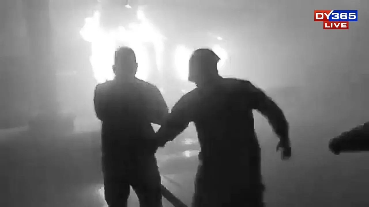  Firefighters trying to control the fire on the coaches 