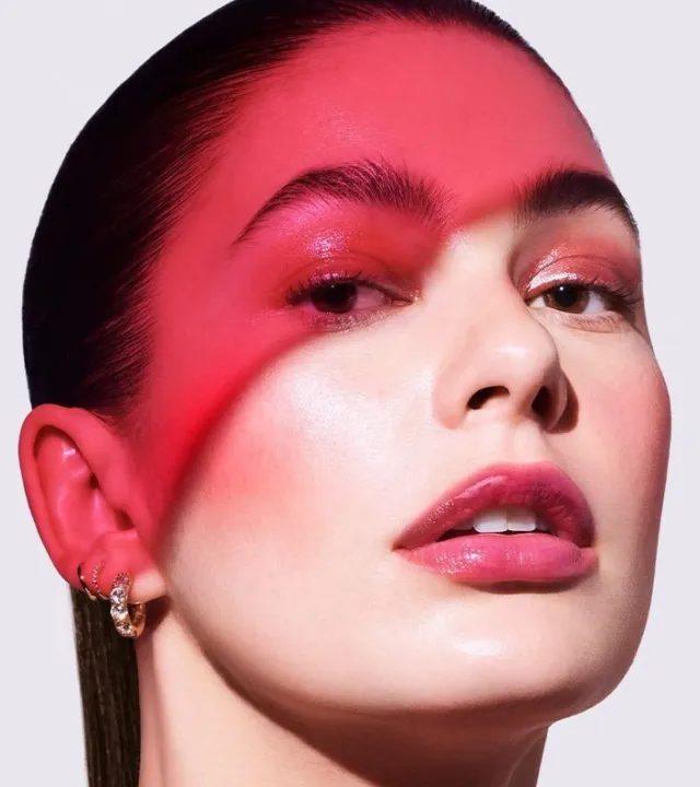 A woman wearing the best satin lipstick in India in the colour of pink