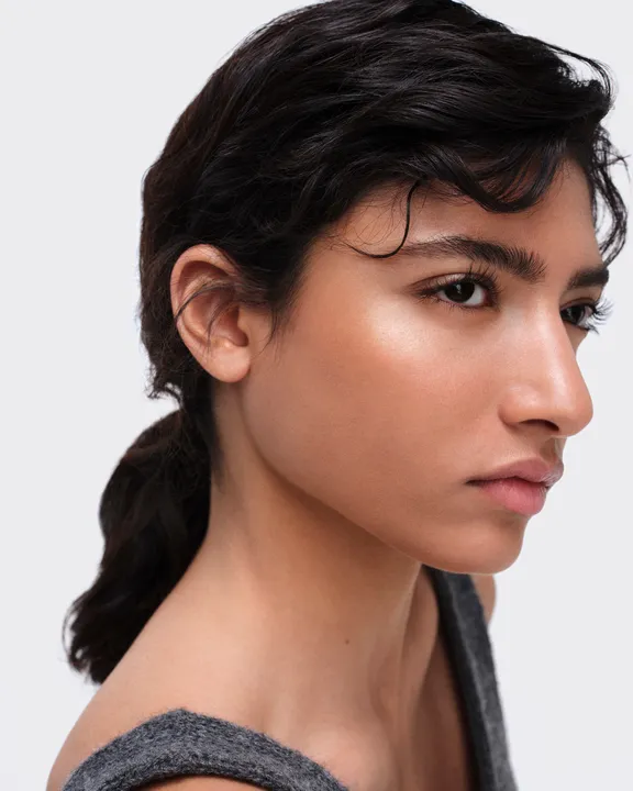 A woman's skin up close and personal wearing a foundation with SPF