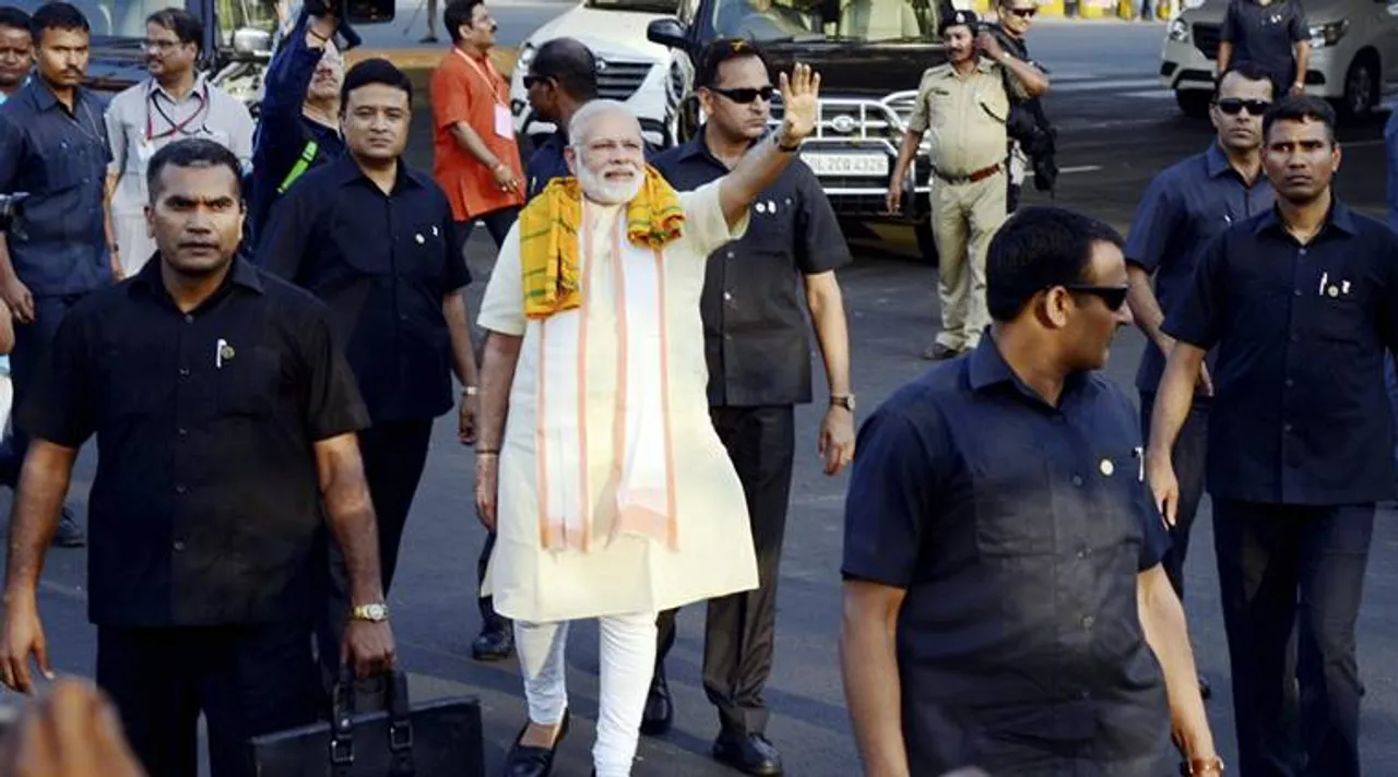  Bhubaneswar: Prime Minister Narendra Modi waves to supporters at Bhubaneswar airport on Saturday.   PTI Photo(PTI4_15_2017_000142b) 
