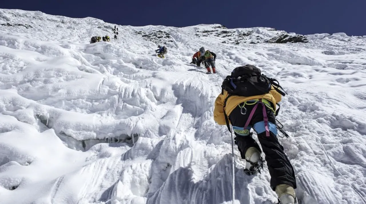 Island Peak,Nepal-April 07,2012:The Climbers climbing the ice wall to the top of Island Peak (Imja Tse) summit(6189m) in the Himayalas Everest region,Nepal. 