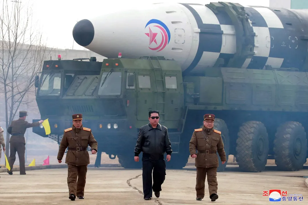  North Korean leader Kim Jong Un walks away from what state media report is a "new type" of intercontinental ballistic missile (ICBM) in this undated photo released on March 24, 2022 by North Korea's Korean Central News Agency (KCNA). KCNA via REUTERS    ATTENTION EDITORS - THIS IMAGE WAS PROVIDED BY A THIRD PARTY. REUTERS IS UNABLE TO INDEPENDENTLY VERIFY THIS IMAGE. NO THIRD PARTY SALES. SOUTH KOREA OUT. NO COMMERCIAL OR EDITORIAL SALES IN SOUTH KOREA.     TPX IMAGES OF THE DAY 