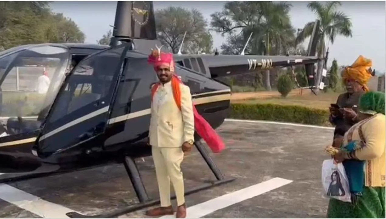  ହେଲିକପ୍ଟରରେ କନିଆଁଙ୍କୁ ନେବାକୁ ପହଞ୍ଚିଲେ ବର, ନିଆରା ବାହାଘର ଦେଖିବାକୁ ଜମିଲା ଭିଡ ।