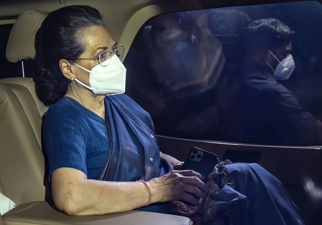  New Delhi: Congress interim President Sonia Gandhi leaves after the end of the Congress Working Committee meeting over party's debacle in recent Assembly elections of five states, at AICC headquarters, in New Delhi, Sunday, March 13, 2022. (PTI Photo/Kamal Singh)(PTI03_13_2022_000297B) 