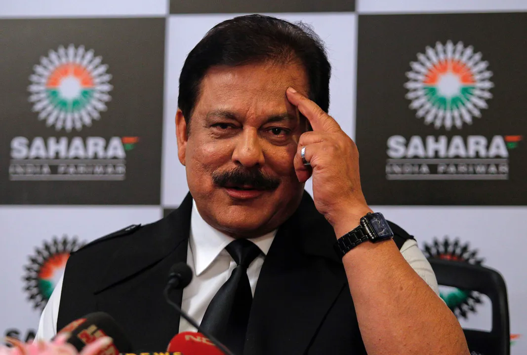  Sahara Group Chairman Subrata Roy gestures as he speaks during a news conference in Mumbai in this February 4, 2012 file photo. Embattled Indian conglomerate Sahara is readying for a court verdict on December 17, 2014 that will determine if it can take on a new loan and refinance debt on its overseas hotels, including the Plaza in New York, to secure the release of its jailed chief.  REUTERS/Danish Siddiqui/Files (INDIA - Tags: BUSINESS HEADSHOT CRIME LAW) 