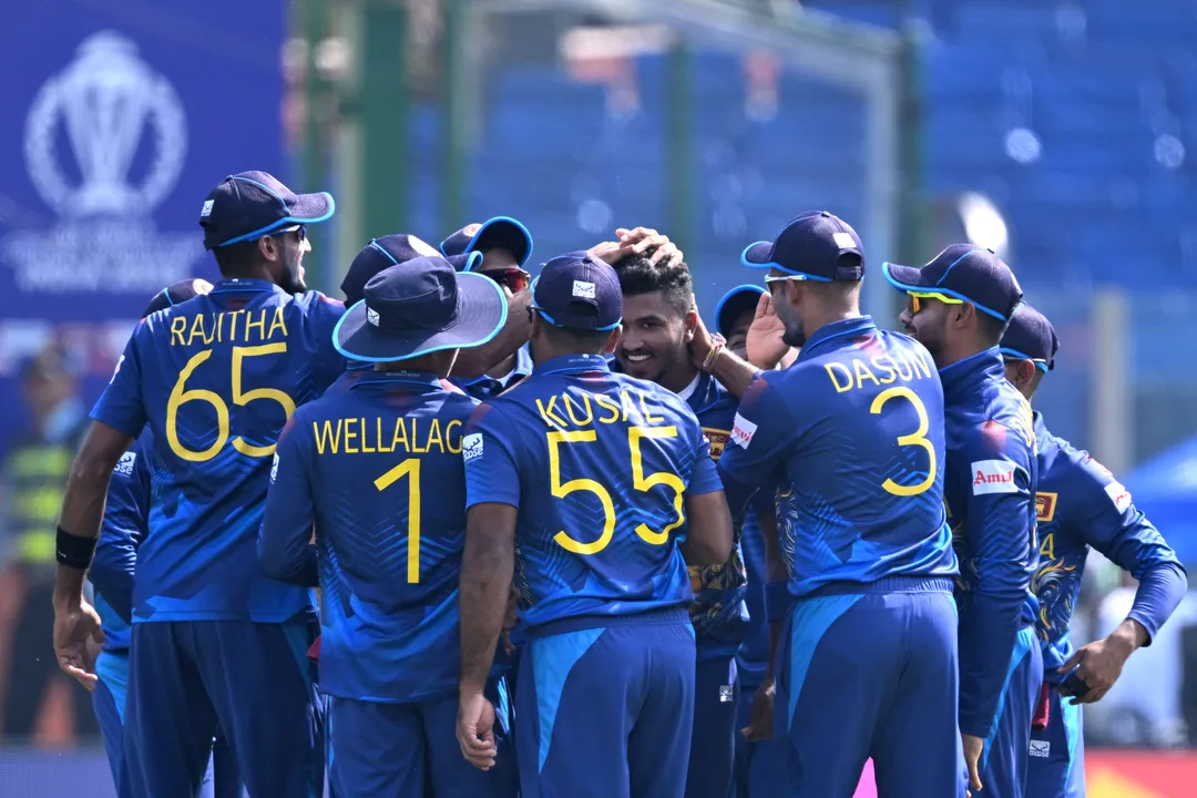  Sri Lankan players celebrate after the dismissal of South Africa's captain Temba Bavuma during the 2023 ICC Men's Cricket World Cup one-day international (ODI) match between South Africa and Sri Lanka at the Arun Jaitley Stadium in New Delhi on October 7, 2023. (Photo by Sajjad HUSSAIN / AFP) / -- IMAGE RESTRICTED TO EDITORIAL USE - STRICTLY NO COMMERCIAL USE -- (Photo by SAJJAD HUSSAIN/AFP via Getty Images) 