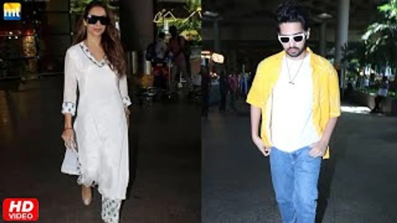 Malaika Arora In Breezy White Salwar Suit; Armaan Malik At Airport