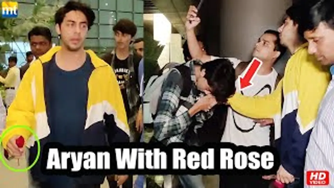Shah Rukh Khan's Son Aryan Khan returns with Red Rose in hand, fans Kisses Aryan hands