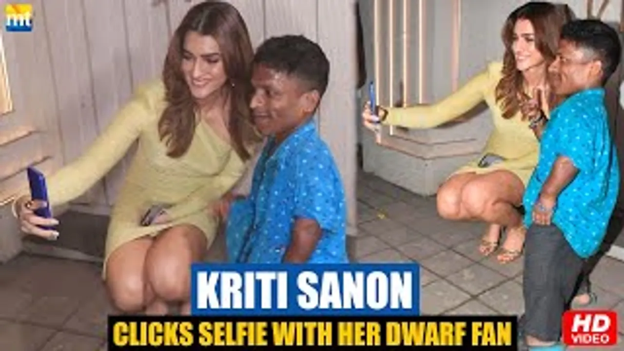 Kriti Sanon's Dwarf Fan struggles to meet her, Watch her Sweet Gesture towards him