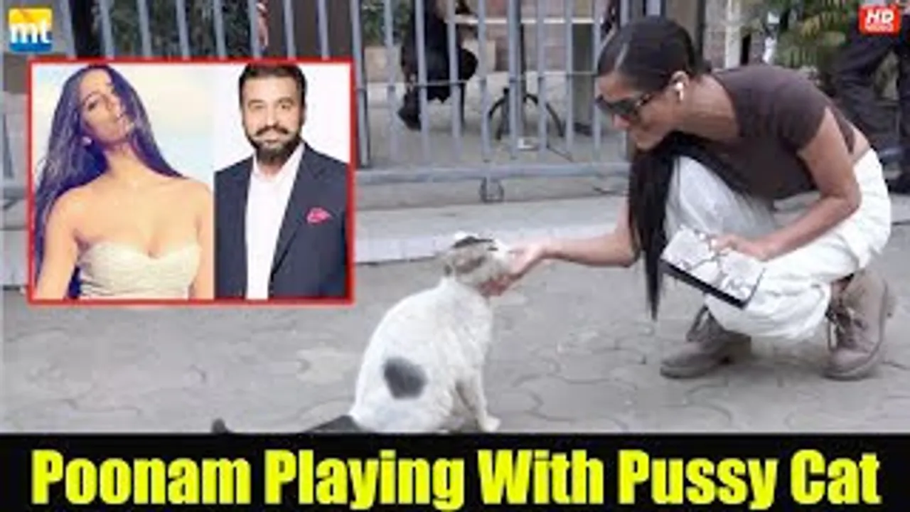 Poonam Pandey playing with Pussy Cat at Coffee Shop amidst Raj Kundra adult video case