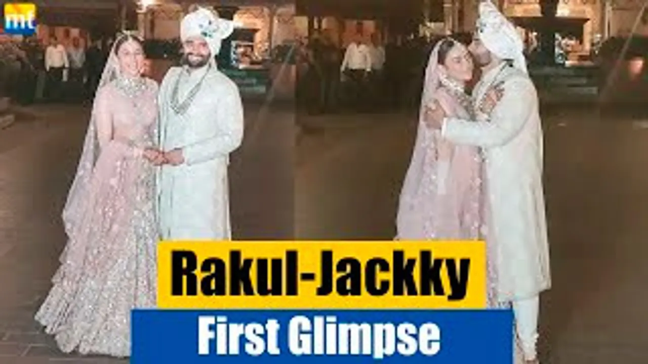 Jackky Bhagnani Gives A Kiss To Wife Rakul Preet Singh As They Pose After The Wedding