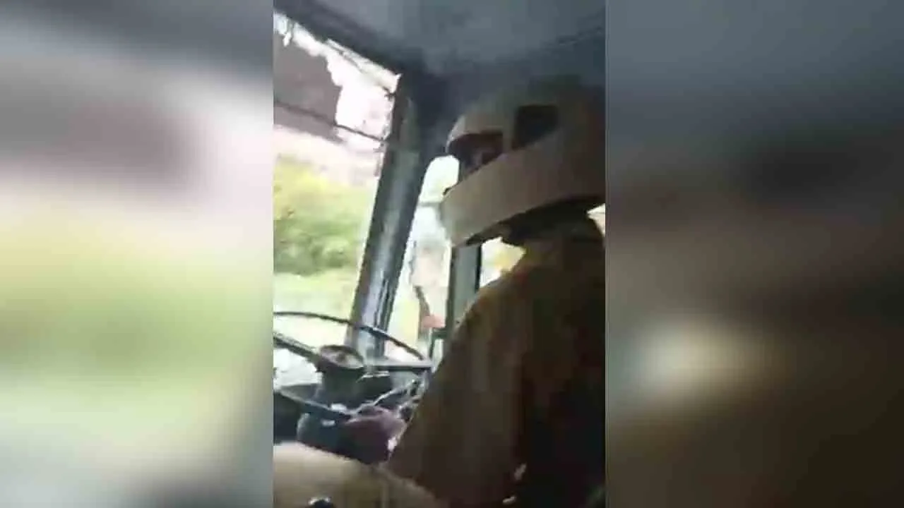  kerala government Bus driver wearing helmet to protect self for bharath bandh struggle 