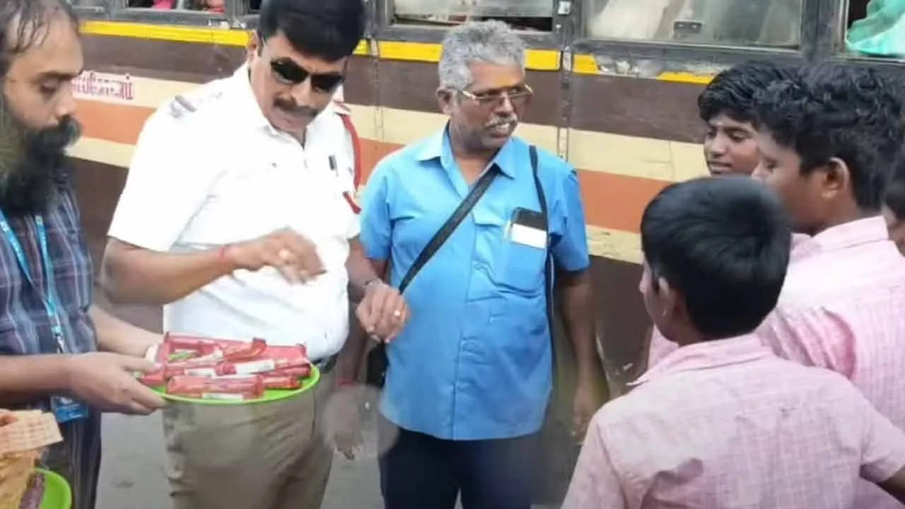  Trip on stairs; Policeman tried to correct him by giving him chocolate Photograph: (thanjavur) 